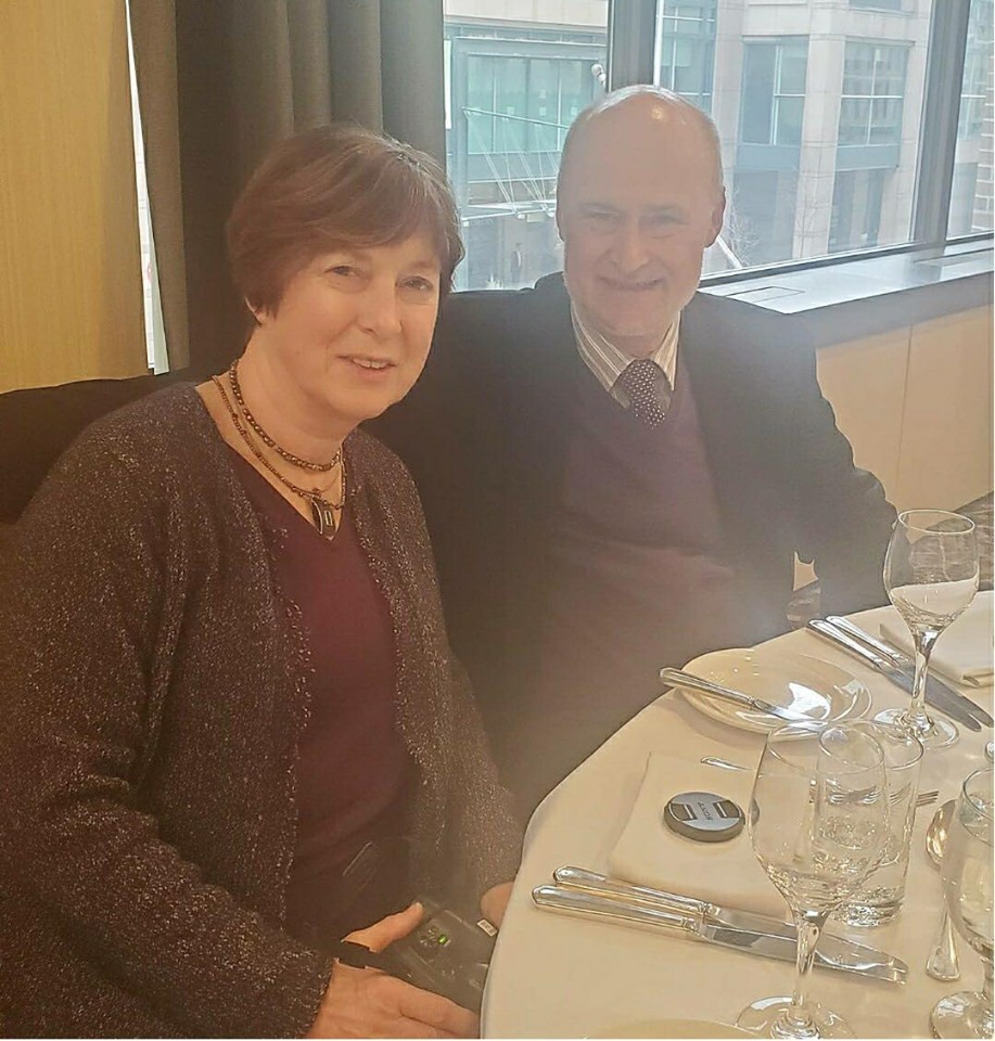 man and woman at a dinner table